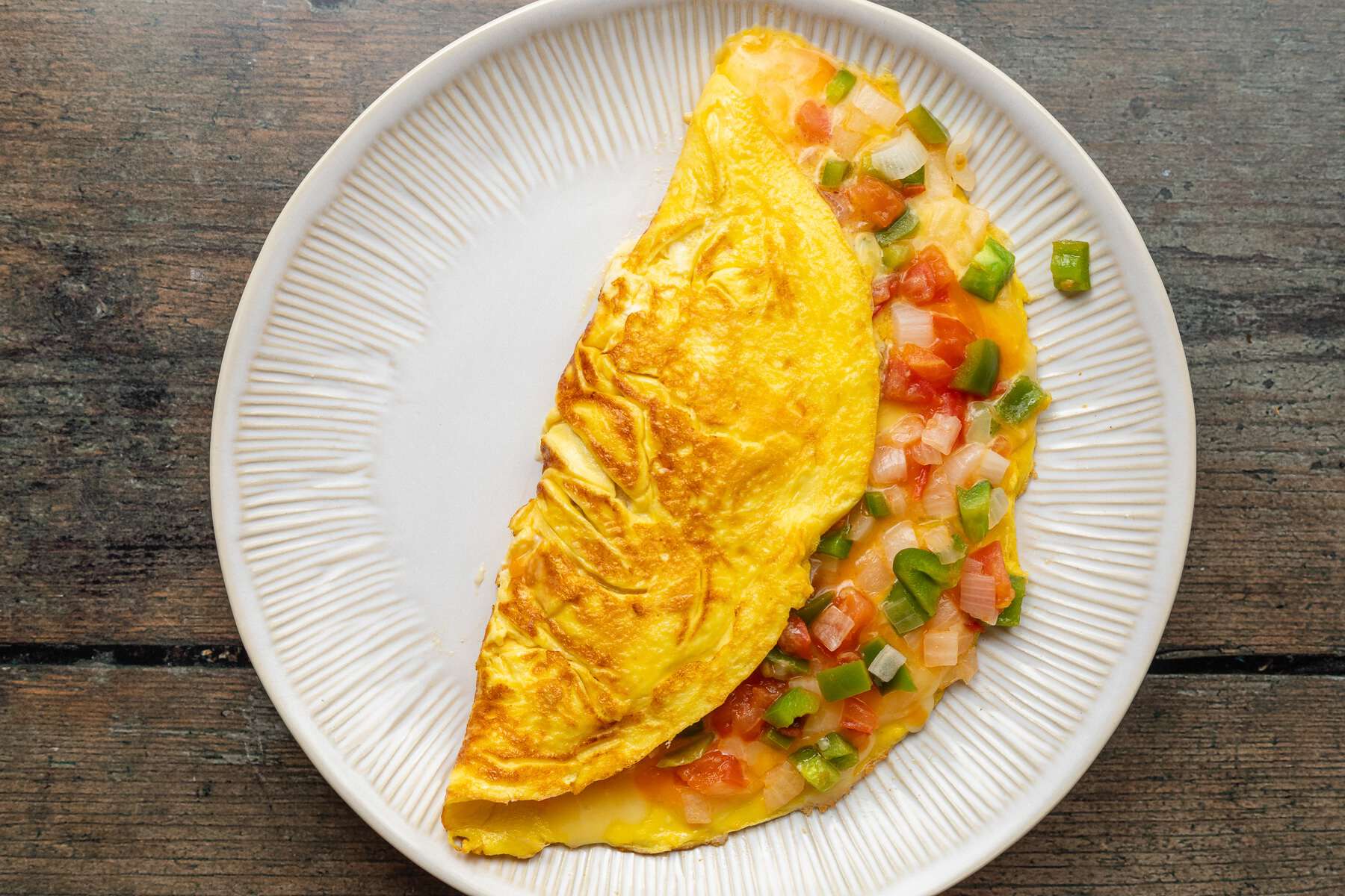 bacon-avocado-and-cheese-omelets-with-tomato-salsa-recipe